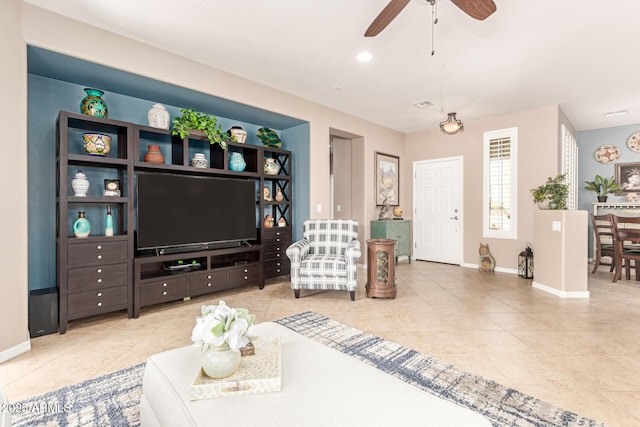 living room featuring tile patterned floors, recessed lighting, baseboards, and ceiling fan