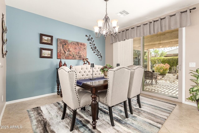 tiled dining space with baseboards, visible vents, and a chandelier