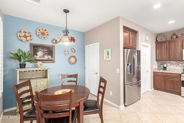 dining area featuring recessed lighting, light tile patterned flooring, baseboards, and visible vents