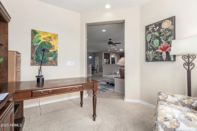 carpeted office space featuring recessed lighting, a ceiling fan, and baseboards