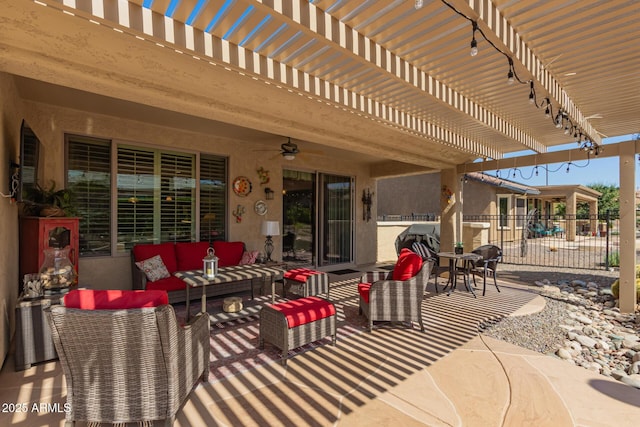 view of patio / terrace with an outdoor hangout area, fence, a ceiling fan, and a pergola