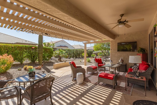 view of patio / terrace featuring an outdoor hangout area, a pergola, a fenced backyard, and a ceiling fan