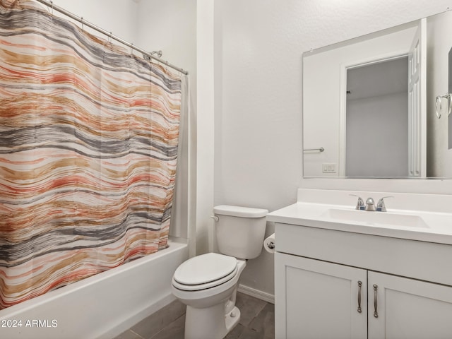 full bathroom with toilet, vanity, and shower / bath combo with shower curtain