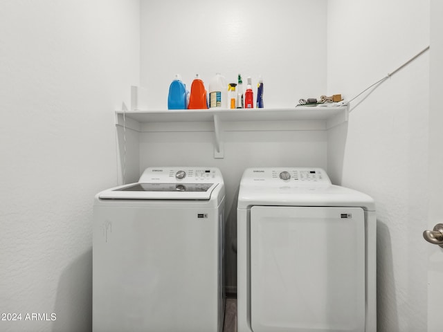 laundry area featuring washing machine and dryer