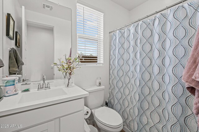 37954 N Greasewood Way, San Tan Valley, AZ 85140 - full bathroom with toilet, vanity, and a shower with shower curtain
