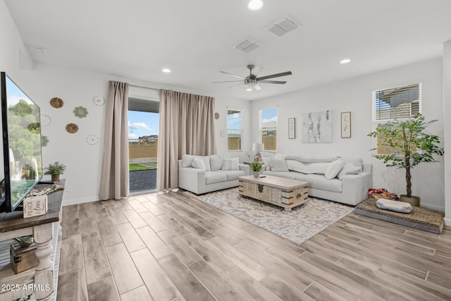 37954 N Greasewood Way, San Tan Valley, AZ 85140 - living area with wood finished floors, a ceiling fan, recessed lighting, and baseboards