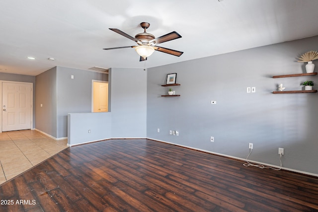 interior space featuring ceiling fan and light wood-type flooring