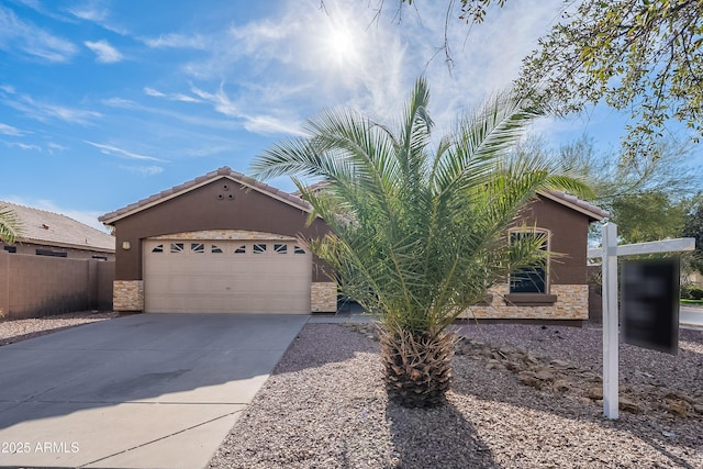 view of front of property with a garage