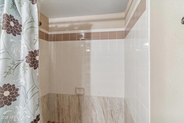 bathroom with curtained shower