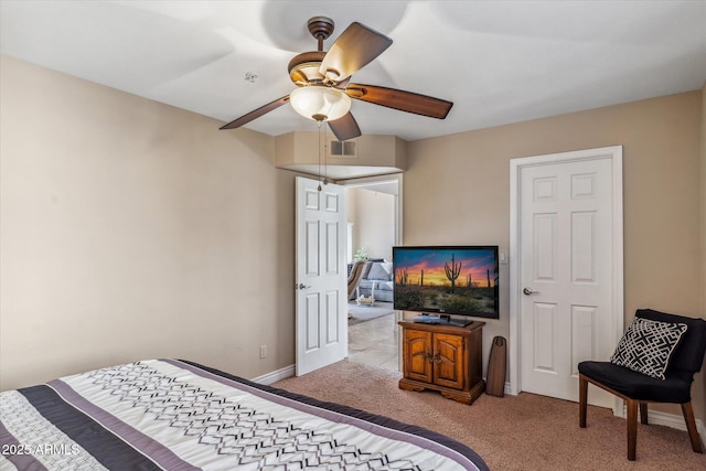 bedroom with light colored carpet and ceiling fan