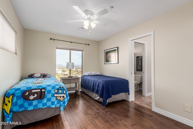 bedroom with a ceiling fan, dark wood-style flooring, and baseboards