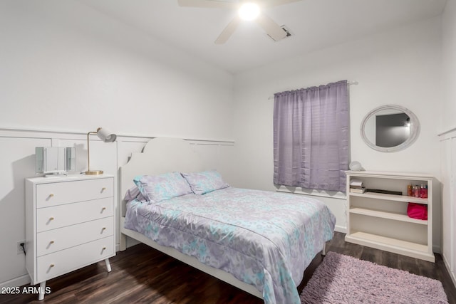 bedroom featuring a ceiling fan and wood finished floors