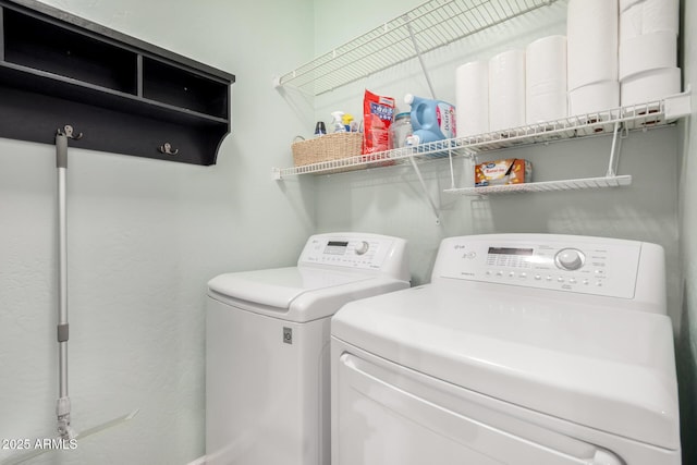 laundry room featuring laundry area and washer and clothes dryer