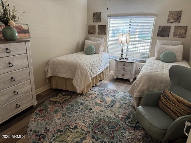 bedroom with light hardwood / wood-style flooring