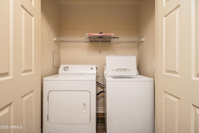 washroom featuring washing machine and dryer