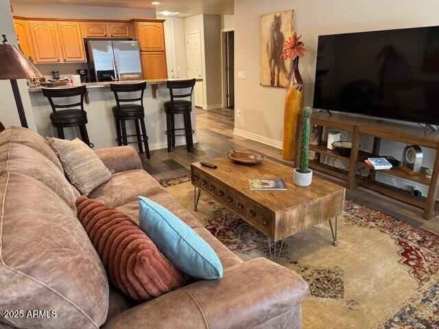 living room with light hardwood / wood-style flooring