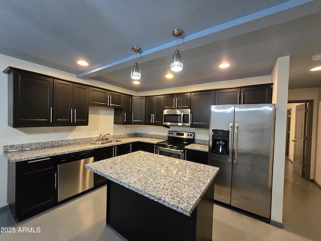 2302 N 36th St Ofc, Ofc, Phoenix, AZ 85008 - kitchen featuring appliances with stainless steel finishes, recessed lighting, pendant lighting, a center island, and light stone counters