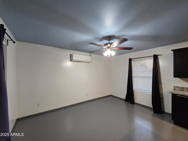 2302 N 36th St Ofc, Ofc, Phoenix, AZ 85008 - spare room featuring an AC wall unit, ceiling fan, and finished concrete floors