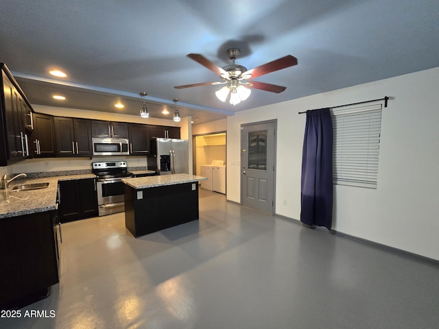 2302 N 36th St Ofc, Ofc, Phoenix, AZ 85008 - kitchen with appliances with stainless steel finishes, separate washer and dryer, recessed lighting, ceiling fan, and light stone countertops