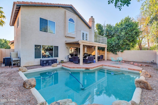 view of swimming pool featuring a patio area and an outdoor hangout area