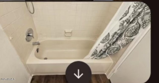 4601 N 102nd Ave Unit 2202, Phoenix, AZ 85037 - full bath featuring shower / bath combo and wood finished floors