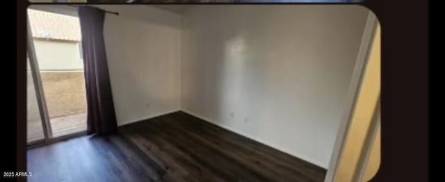 4601 N 102nd Ave Unit 2202, Phoenix, AZ 85037 - empty room with dark wood-type flooring and arched walkways