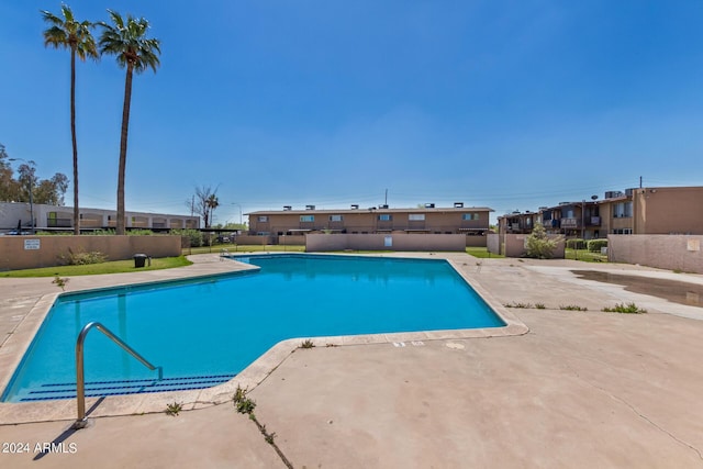 view of swimming pool featuring a patio