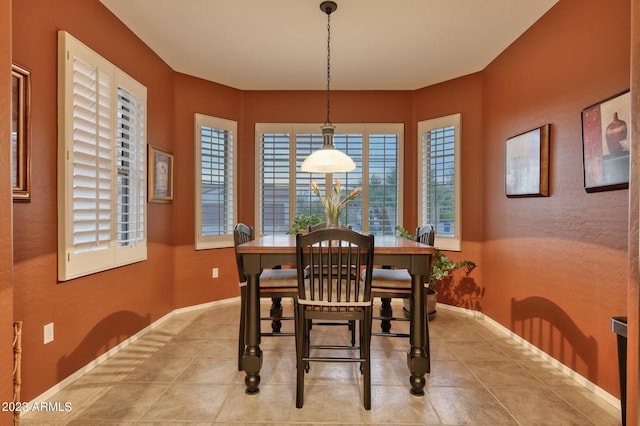 view of tiled dining space