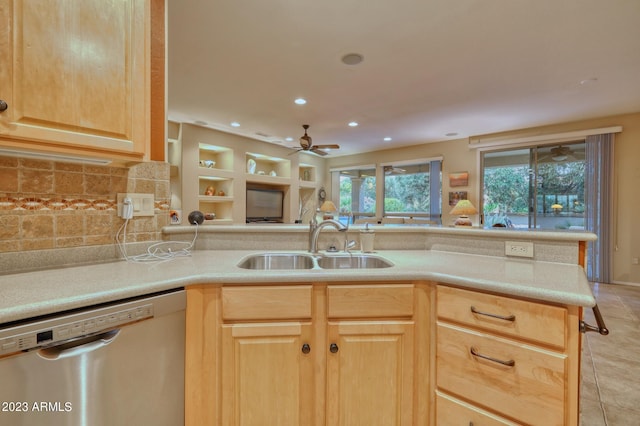 kitchen featuring stainless steel dishwasher, light brown cabinets, light tile floors, ceiling fan, and backsplash