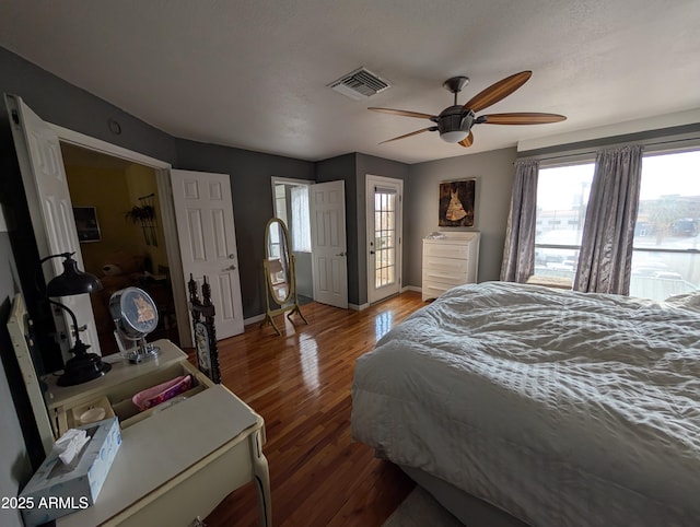 bedroom featuring hardwood / wood-style flooring and ceiling fan