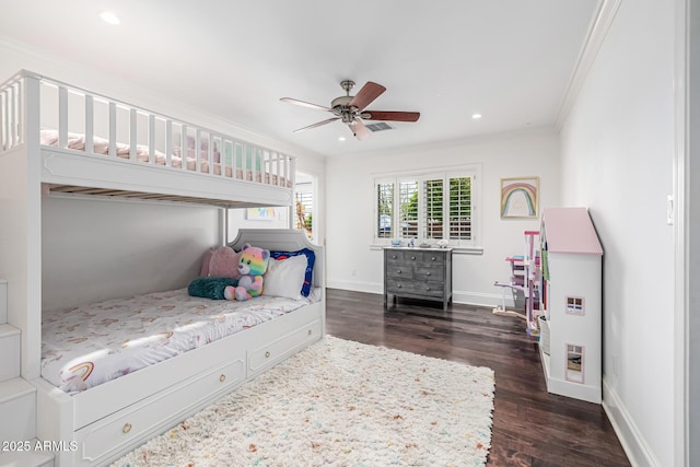 bedroom with visible vents, baseboards, dark wood-style floors, crown molding, and recessed lighting