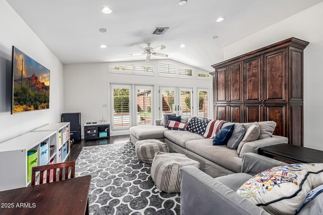 living room featuring ceiling fan, vaulted ceiling, visible vents, recessed lighting, and wood finished floors