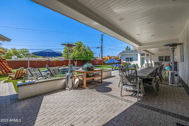 view of patio / terrace with fence and outdoor dining area