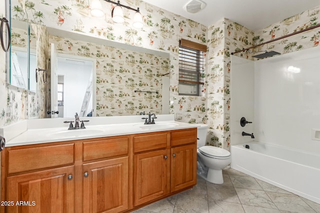 full bathroom with vanity, toilet, and shower / bathtub combination