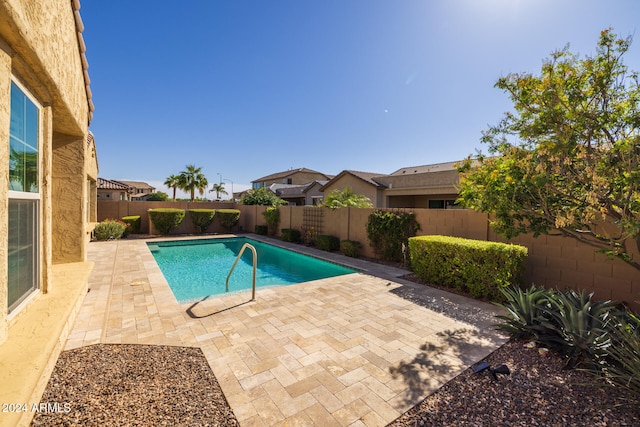 view of pool featuring a patio area