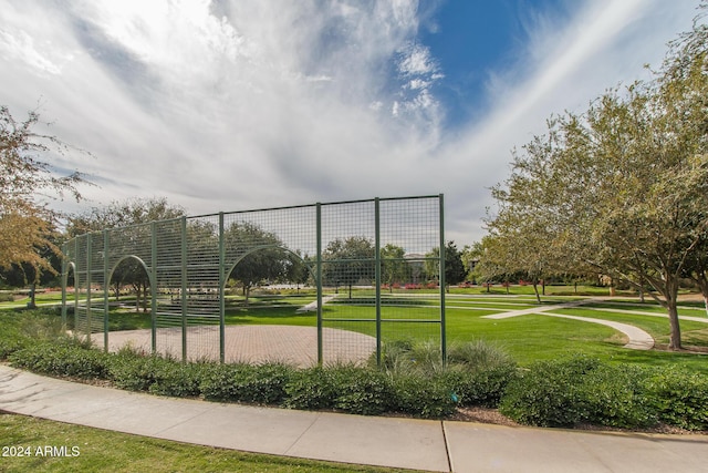 view of property's community featuring a yard