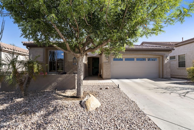 4524 E Narrowleaf Dr, Gilbert, AZ 85298 - view of front of home with stucco siding, an attached garage, driveway, and a tile roof