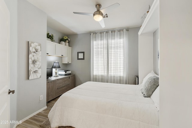 4524 E Narrowleaf Dr, Gilbert, AZ 85298 - bedroom with wood finished floors and ceiling fan