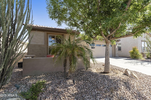 4524 E Narrowleaf Dr, Gilbert, AZ 85298 - view of front of house featuring a garage, stucco siding, driveway, and a tiled roof