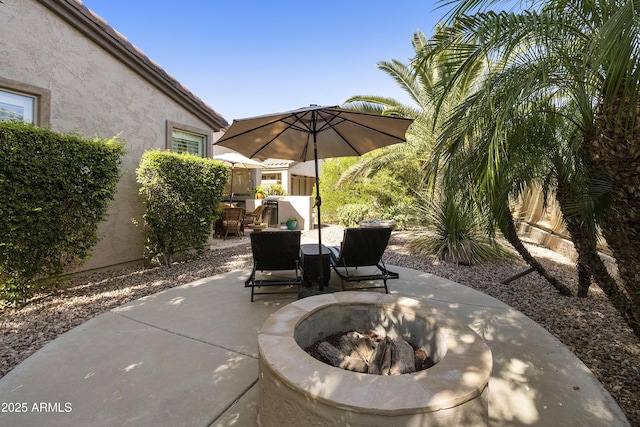 4524 E Narrowleaf Dr, Gilbert, AZ 85298 - view of patio / terrace with a fire pit