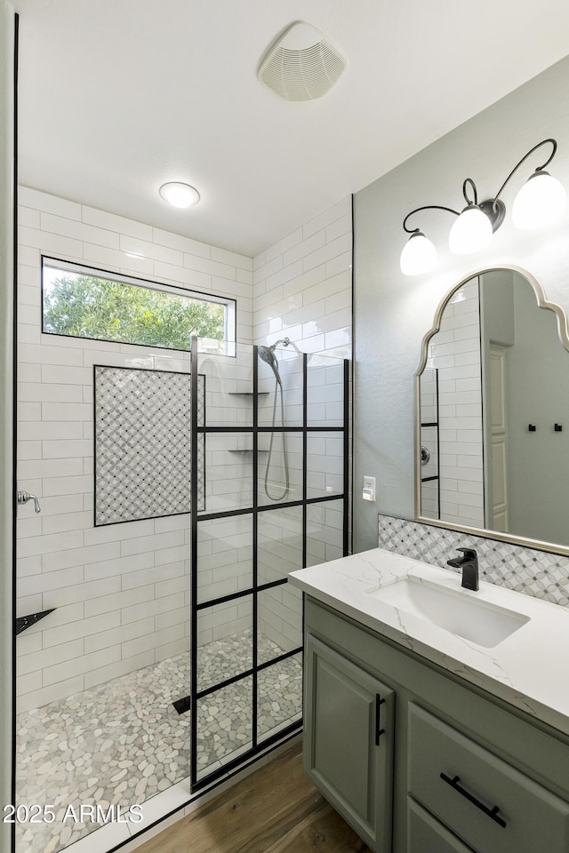 4524 E Narrowleaf Dr, Gilbert, AZ 85298 - bathroom featuring walk in shower, wood finished floors, and vanity