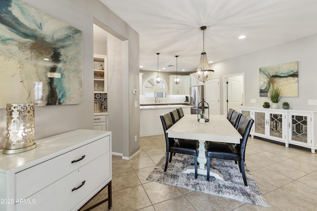 4524 E Narrowleaf Dr, Gilbert, AZ 85298 - dining room with light tile patterned flooring, recessed lighting, and a chandelier