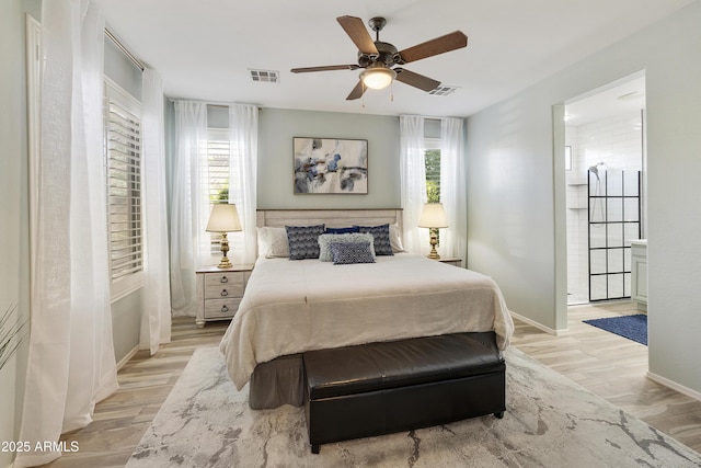 4524 E Narrowleaf Dr, Gilbert, AZ 85298 - bedroom with multiple windows, light wood-style floors, and a ceiling fan