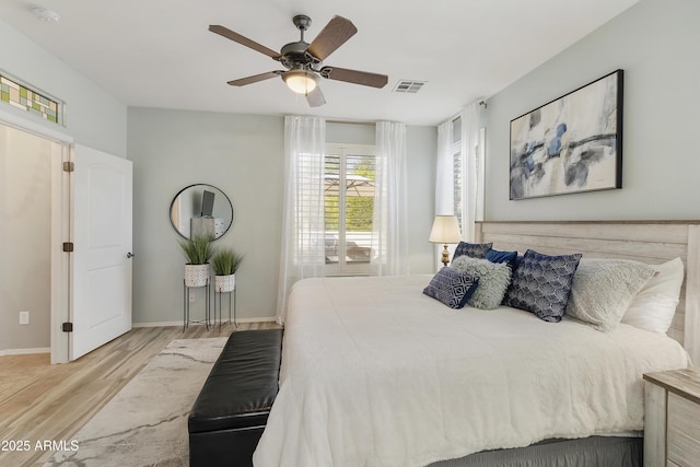 4524 E Narrowleaf Dr, Gilbert, AZ 85298 - bedroom with wood finished floors and ceiling fan