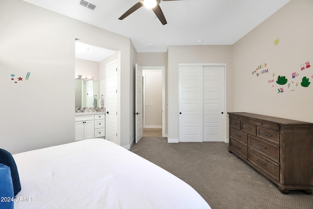 bedroom with a closet, visible vents, carpet flooring, ceiling fan, and baseboards