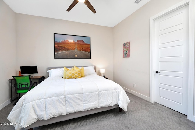 bedroom featuring a ceiling fan, carpet, and baseboards