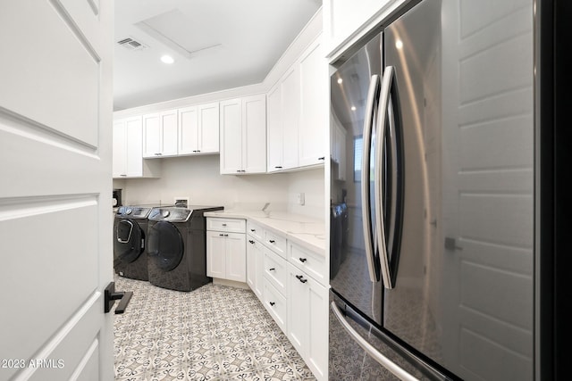 washroom with cabinet space, attic access, visible vents, independent washer and dryer, and recessed lighting