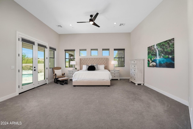 carpeted bedroom with access to outside, visible vents, baseboards, and french doors