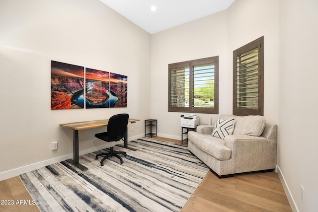 office area with recessed lighting, baseboards, and wood finished floors