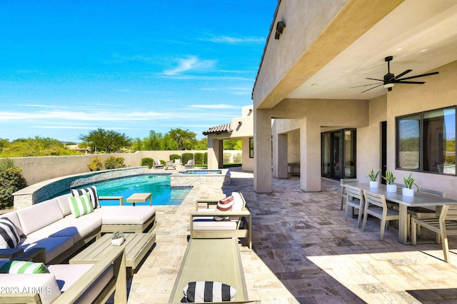 view of swimming pool featuring an outdoor hangout area, a patio, a ceiling fan, and an in ground hot tub